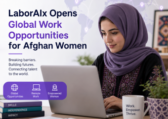 Afghan woman working on a laptop, representing LaborAIx global remote work opportunities for women